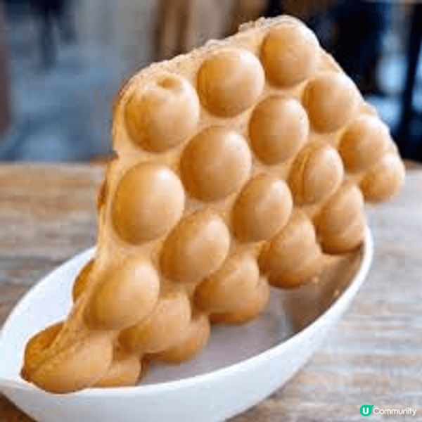 雞蛋仔，作為香港街頭小食嘅代表，以其獨特嘅蜂窩造型、外脆內軟...
