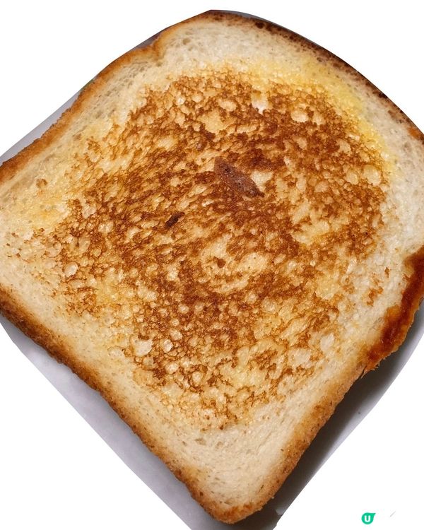 用牛油搽喺麵包嘅表面，有牛油嗰面落鑊