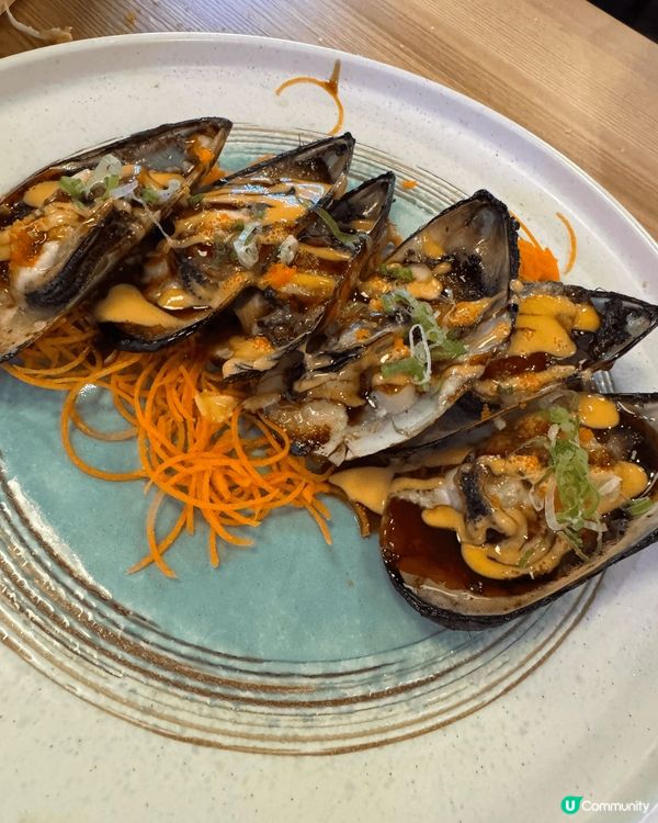 A big boat of sushi rolls, a p...