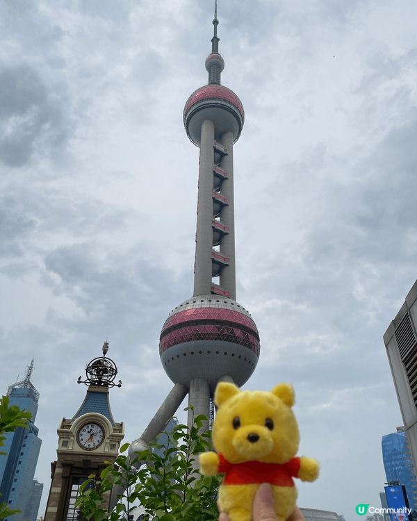 圖一是東方明珠，上海最具代表性的地標，登上263米高的觀光層...