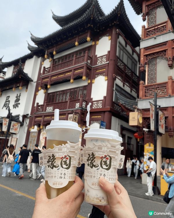 圖一是東方明珠，上海最具代表性的地標，登上263米高的觀光層...