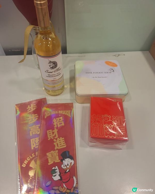用積分用積分換咗招財黃金屋套裝，盒餅都幾好食，支酒我又唔飲嘅...