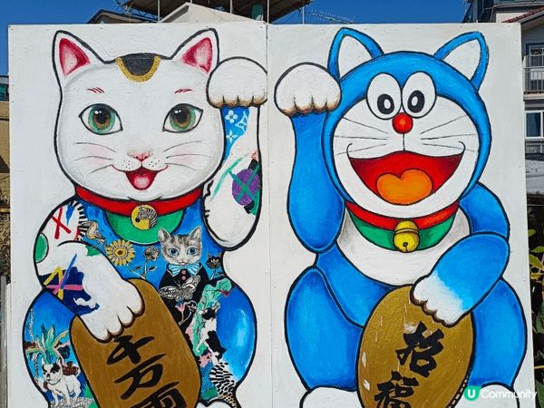 藍地新村壁畫以色彩繽紛的卡通與藝術元素著稱，成為屯門熱門打卡...