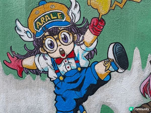 藍地新村壁畫以色彩繽紛的卡通與藝術元素著稱，成為屯門熱門打卡...