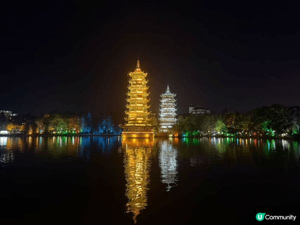 桂林日月雙塔係當地著名地標，由日塔同月塔組成，象徵日與月嘅和...
